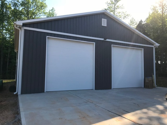 2 large Garage Door Service Installs Repairs Company Charlotte NC Matthews NC Indian Trail Monroe NC
